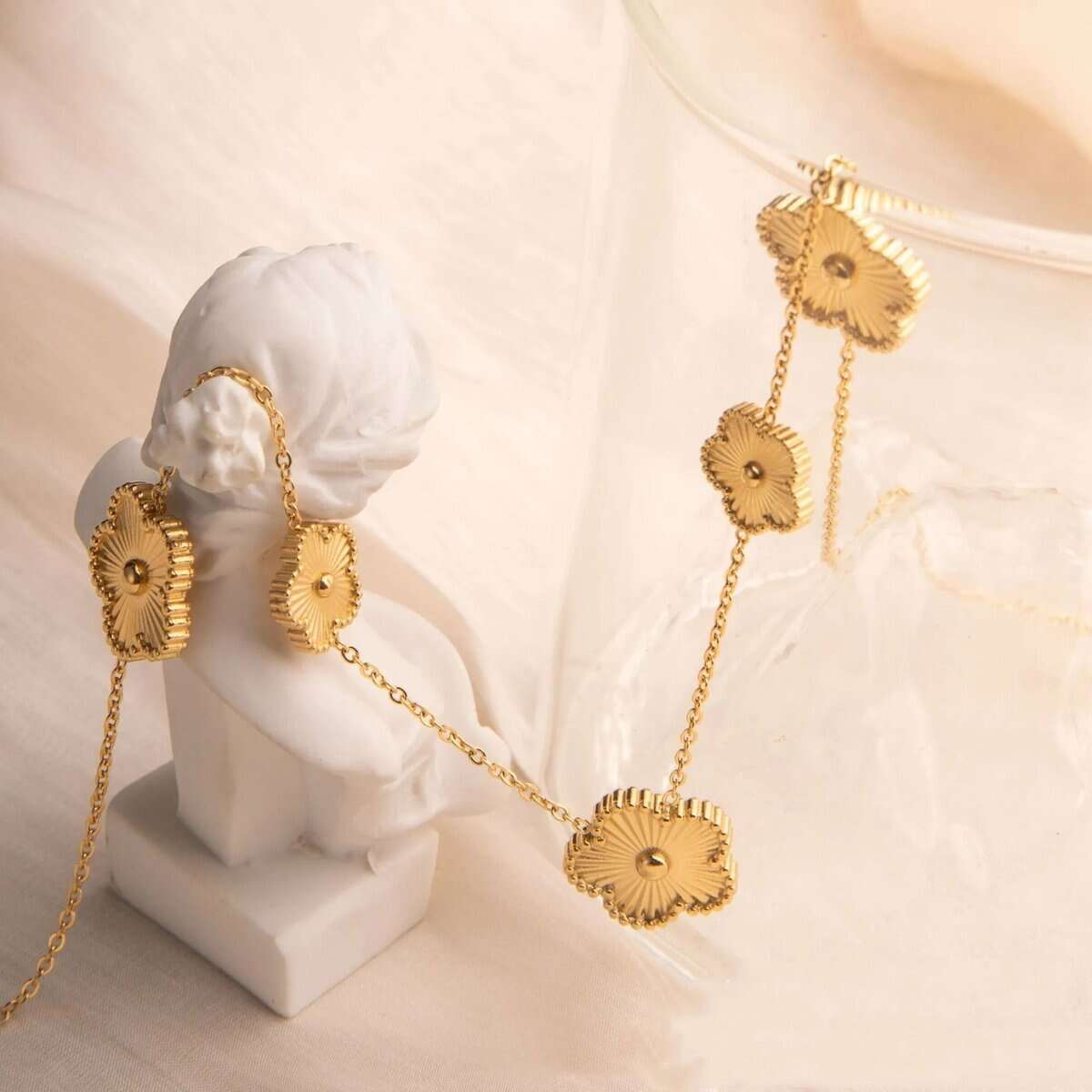 Gold flower chain necklace and earrings, vintage luxury jewelry.