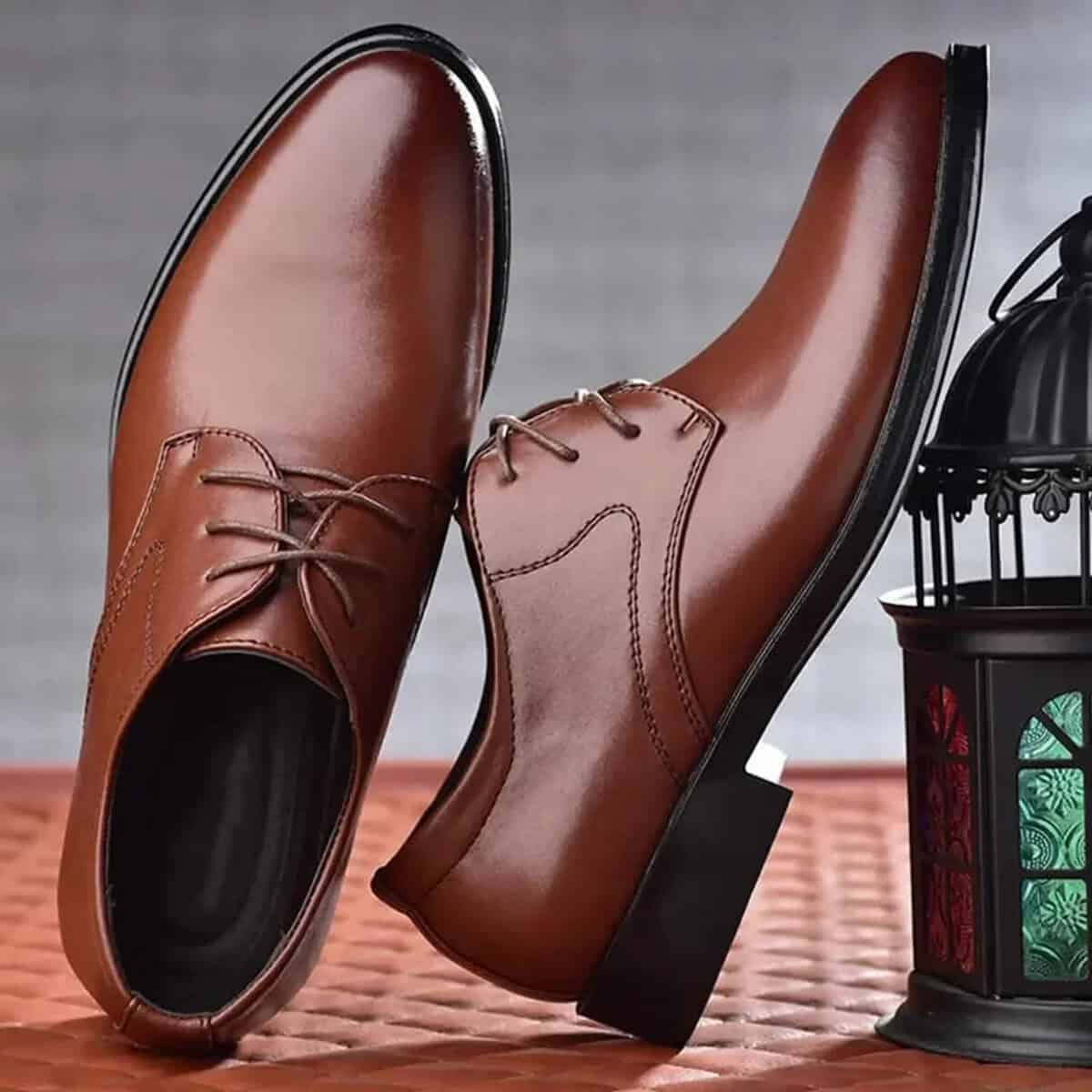 Classic brown leather men's dress shoes for old money style.